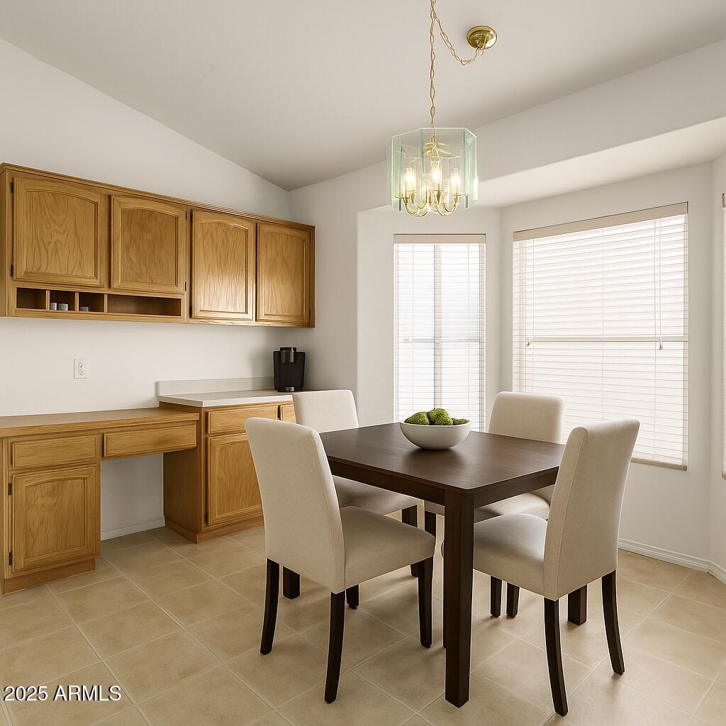 14806 West Verde Lane Goodyear, AZ 85395 - Photo 10 of 30 a view of a dining room with furniture and window