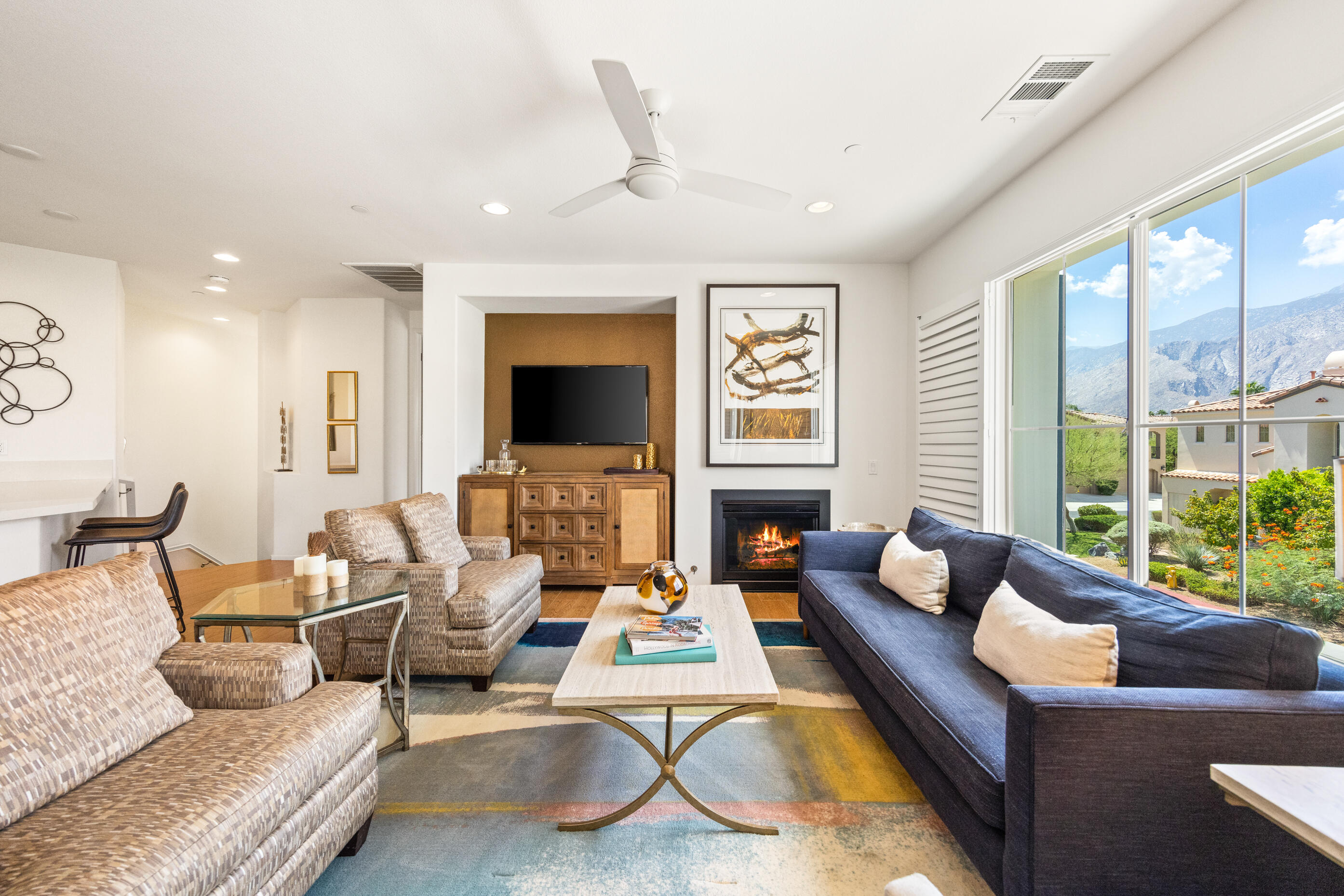 374 Terra Vita Palm Springs, CA 92262 - Photo 1 of 34 a living room with furniture or couch and a large window