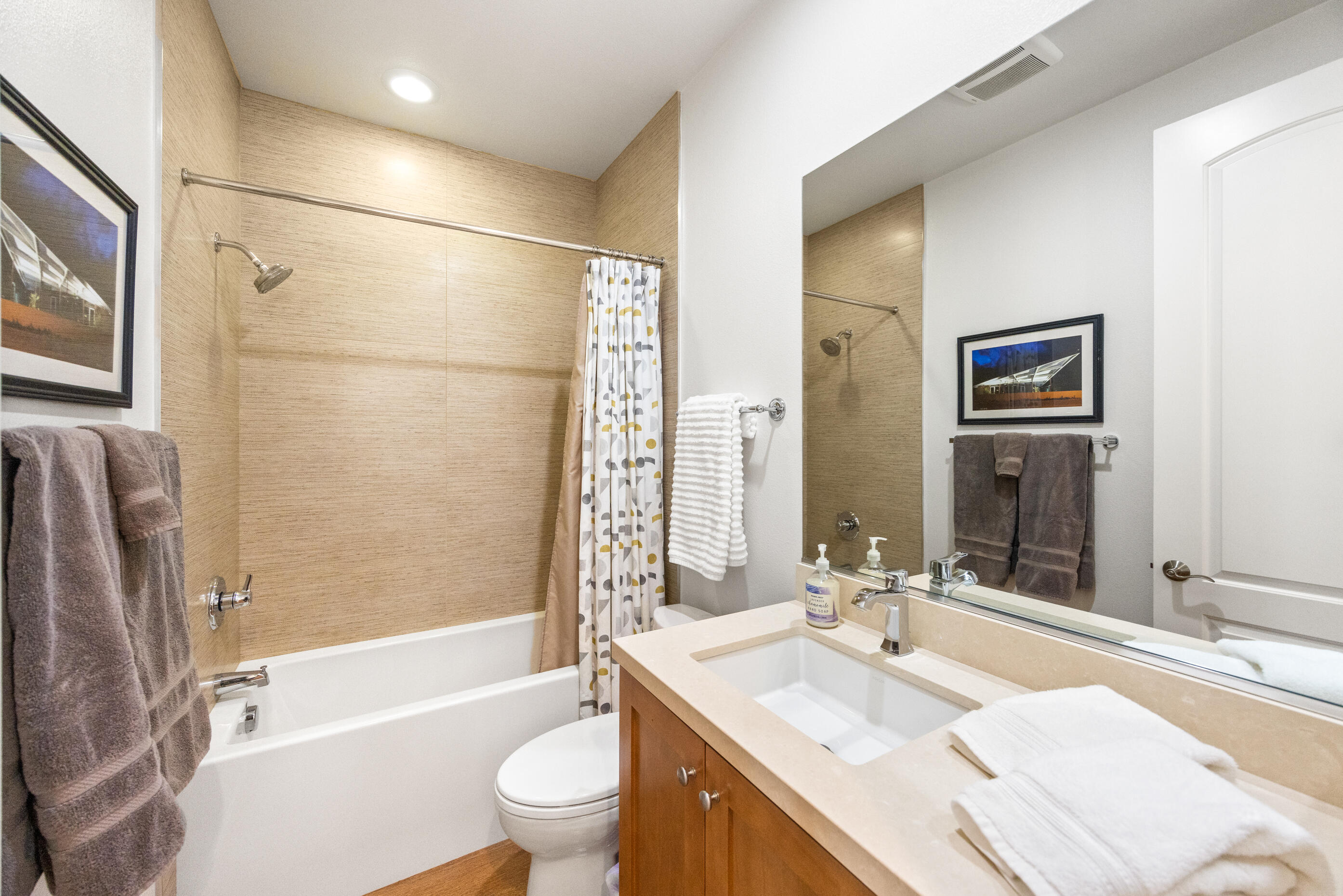 374 Terra Vita Palm Springs, CA 92262 - Photo 23 of 34 a bathroom with a granite countertop sink mirror toilet and bathtub
