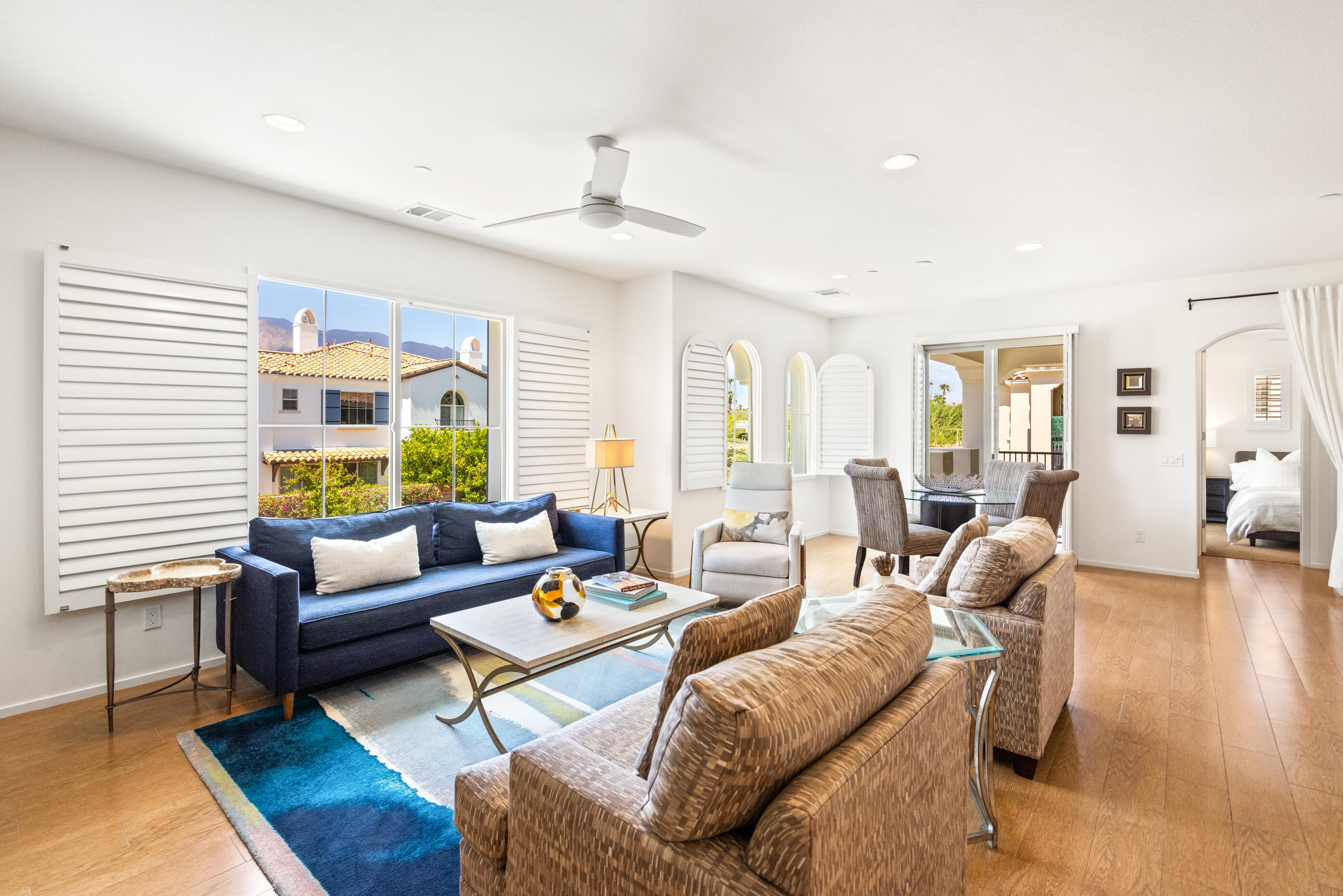 374 Terra Vita Palm Springs, CA 92262 - Photo 5 of 34 a living room with furniture and a large window