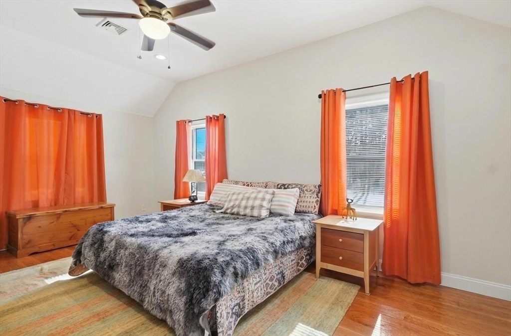 24 Holly Street Billerica, MA 01821 - Photo 12 of 33 a bedroom with a large bed and a window