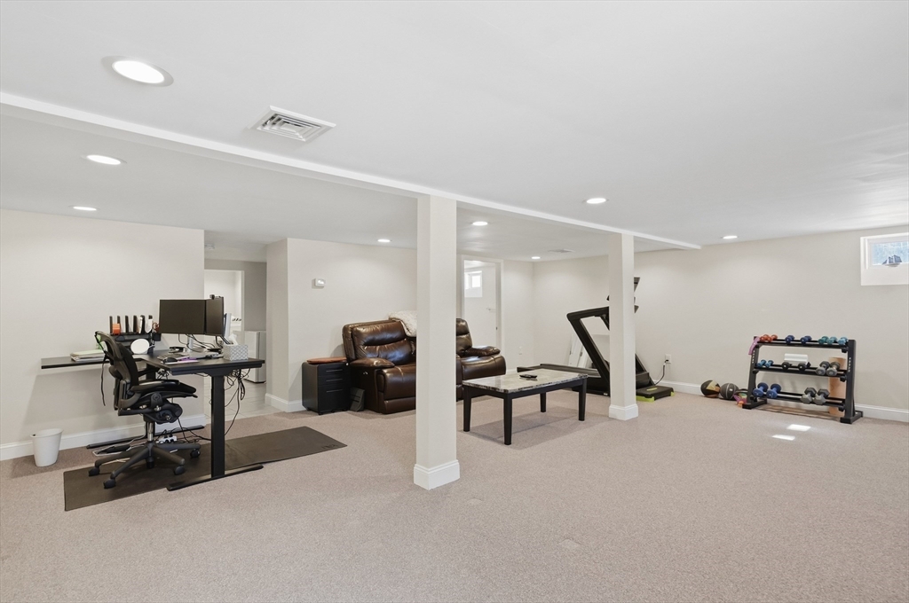 24 Holly Street Billerica, MA 01821 - Photo 20 of 33 a view of a room with gym equipment
