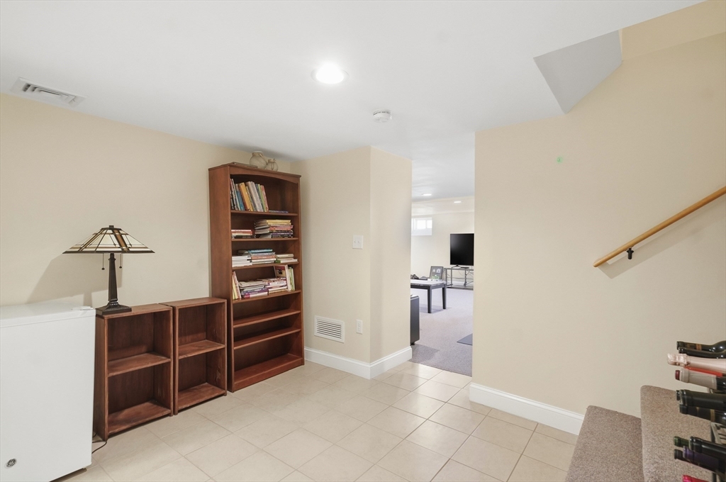 24 Holly Street Billerica, MA 01821 - Photo 25 of 33 a view of cabinets and a room