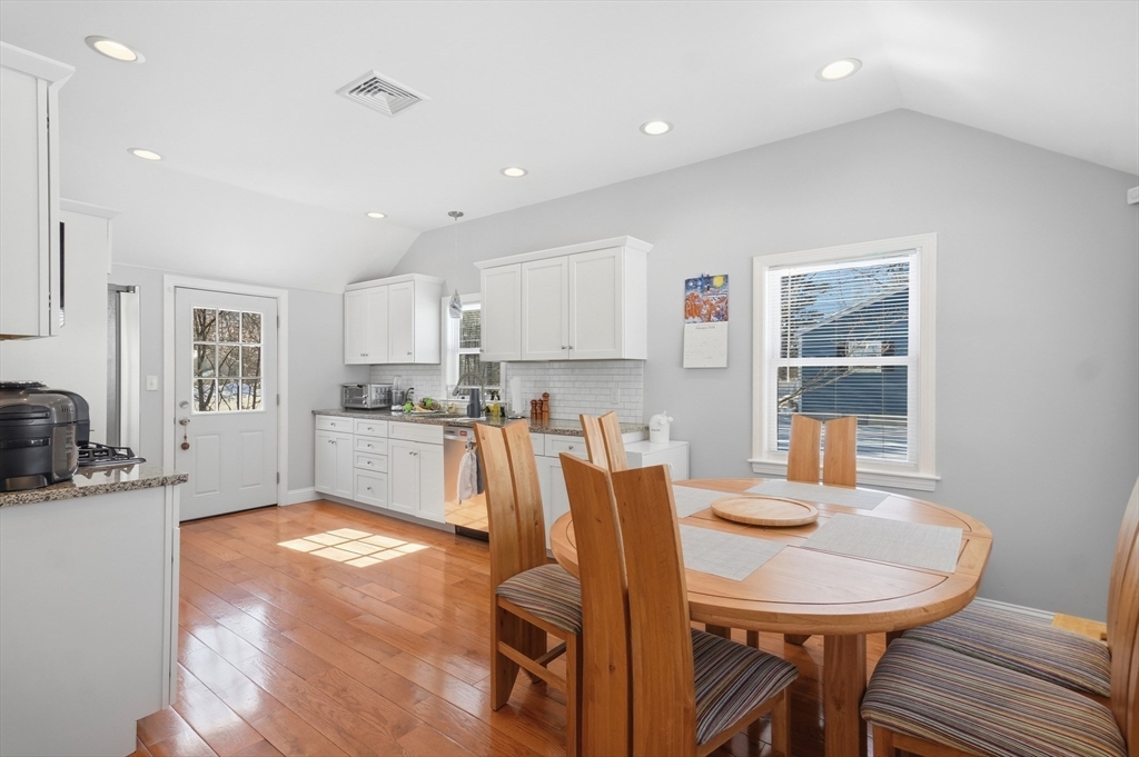 24 Holly Street Billerica, MA 01821 - Photo 6 of 33 a view of a dining room with furniture and a kitchen