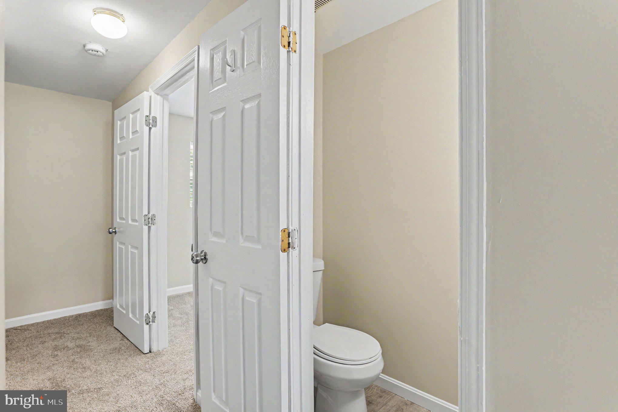 32 Tameron Place Rosedale, MD 21237 - Photo 29 of 39 Half bath and bedroom in basement