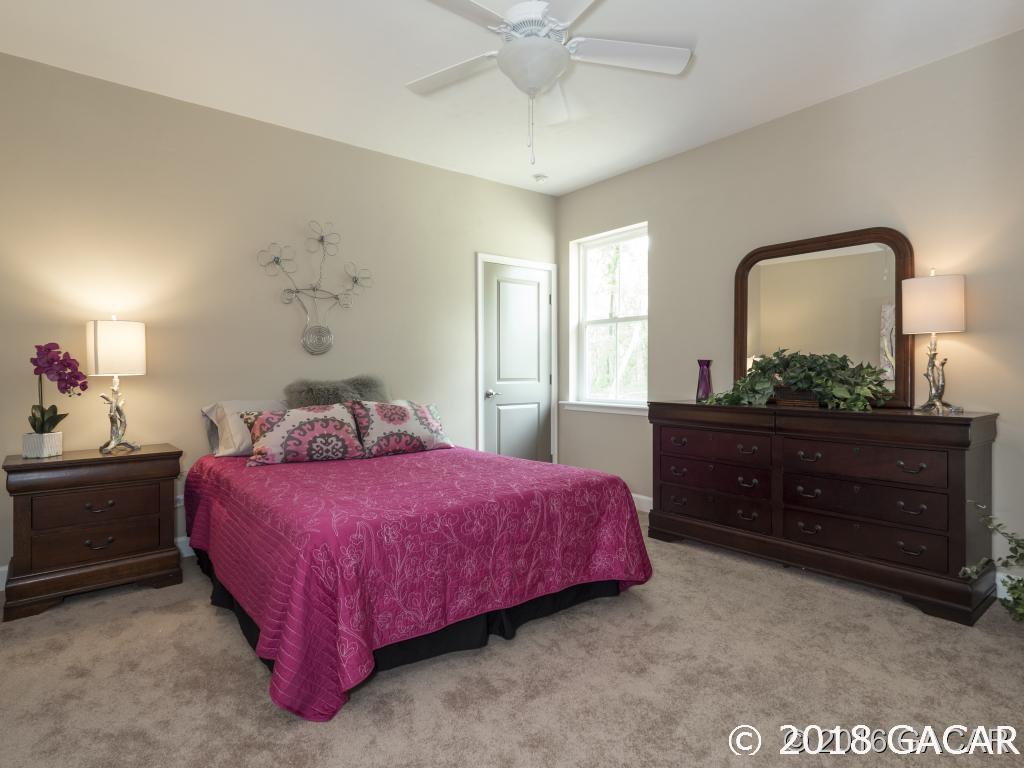 16889 Northwest 2nd Road Newberry, FL 32669 - Photo 15 of 24 1 of 4 Guest Bedrooms