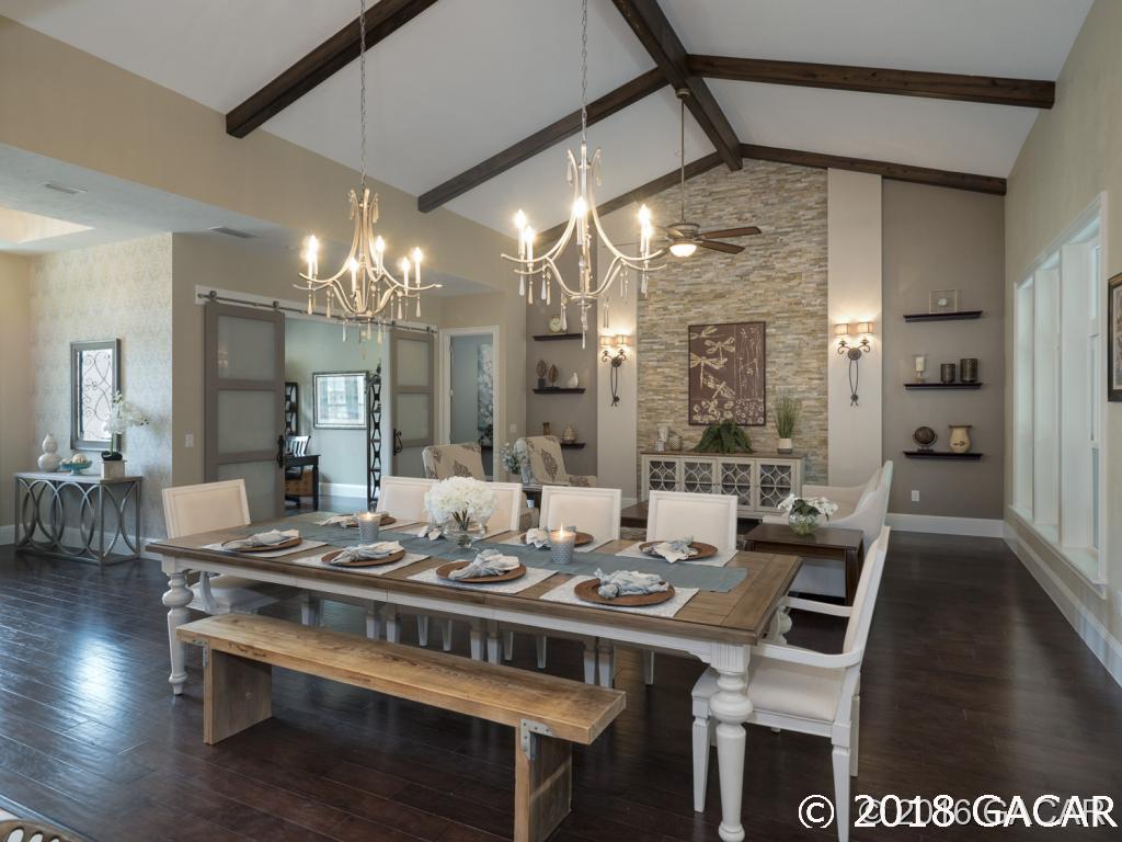 16889 Northwest 2nd Road Newberry, FL 32669 - Photo 3 of 24 Soaring ceilings with timbers