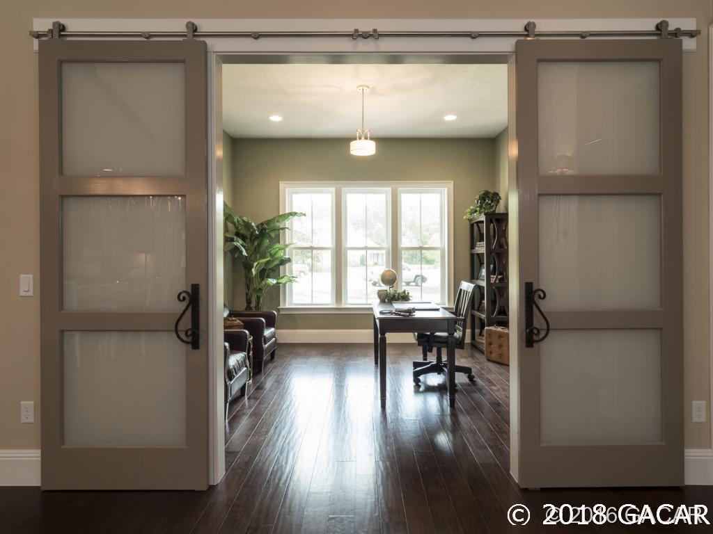 16889 Northwest 2nd Road Newberry, FL 32669 - Photo 8 of 24 Sliding barn doors to study