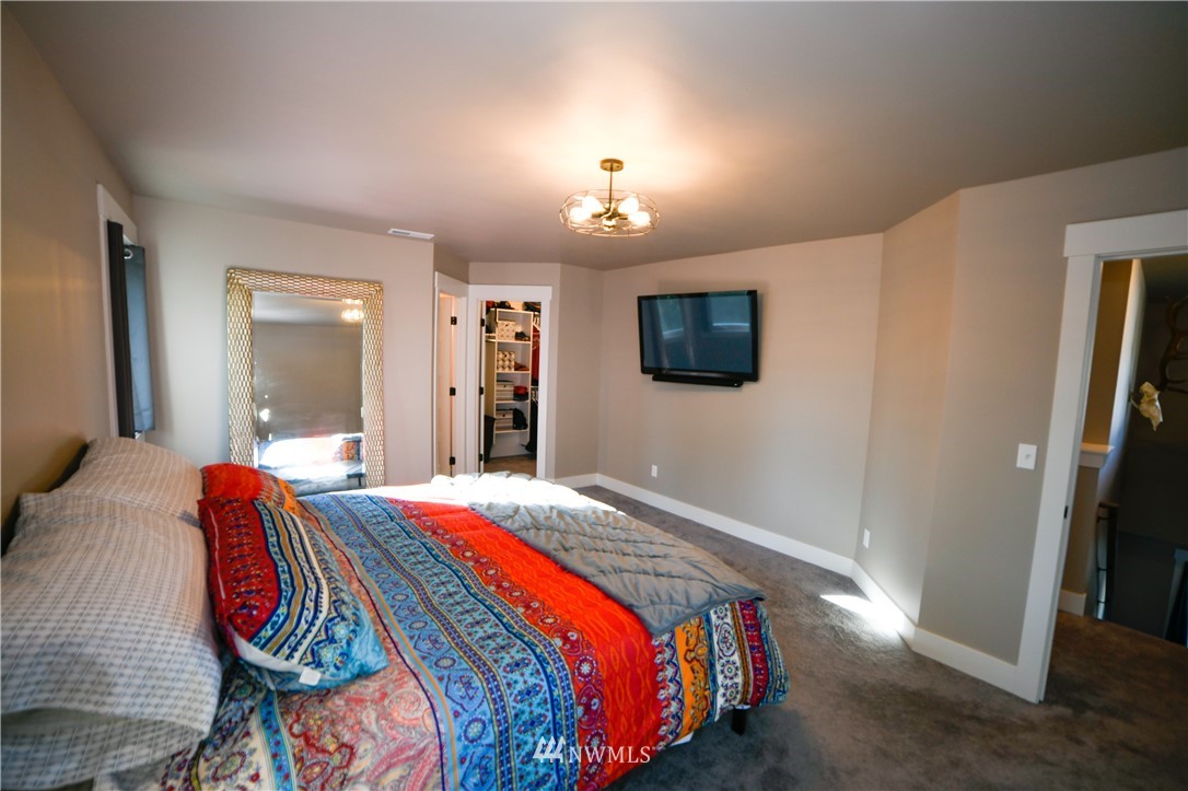 202 St Helens Way Winlock, WA 98596 - Photo 16 of 25 a bedroom with bed and a window