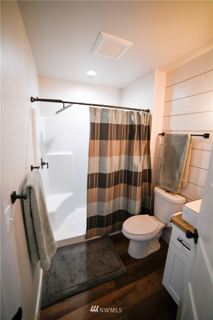 202 St Helens Way Winlock, WA 98596 - Photo 17 of 25 a bathroom with a toilet and a shower