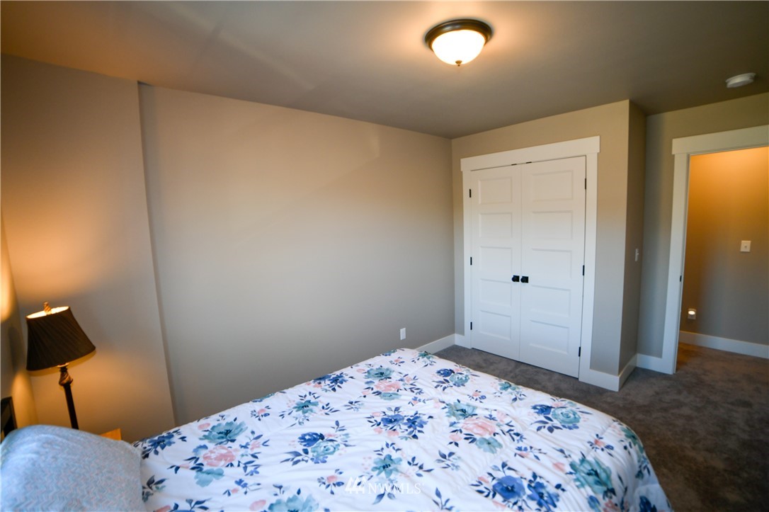 202 St Helens Way Winlock, WA 98596 - Photo 20 of 25 a bedroom with a bed and a closet