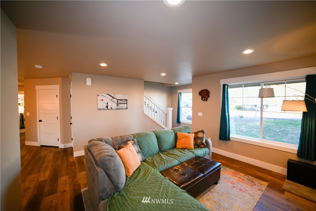 202 St Helens Way Winlock, WA 98596 - Photo 3 of 25 a living room with furniture and a large window