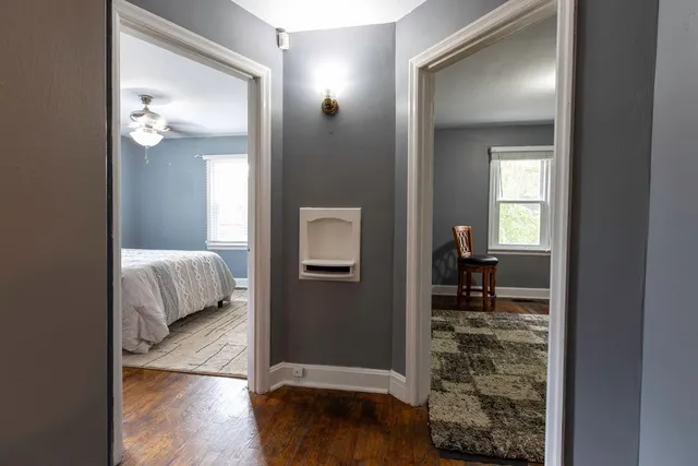 a view of a bedroom from a hallway