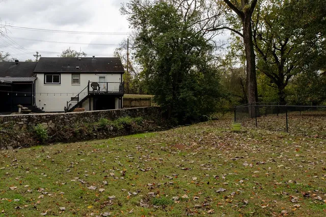a view of a lake with chairs