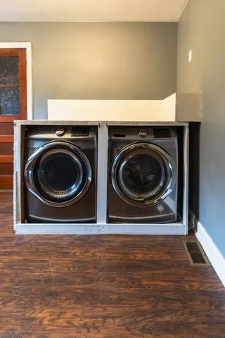 a utility room with dryer and washer
