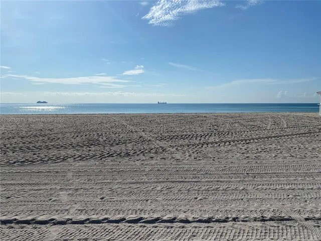 a view of beach and an ocean beach