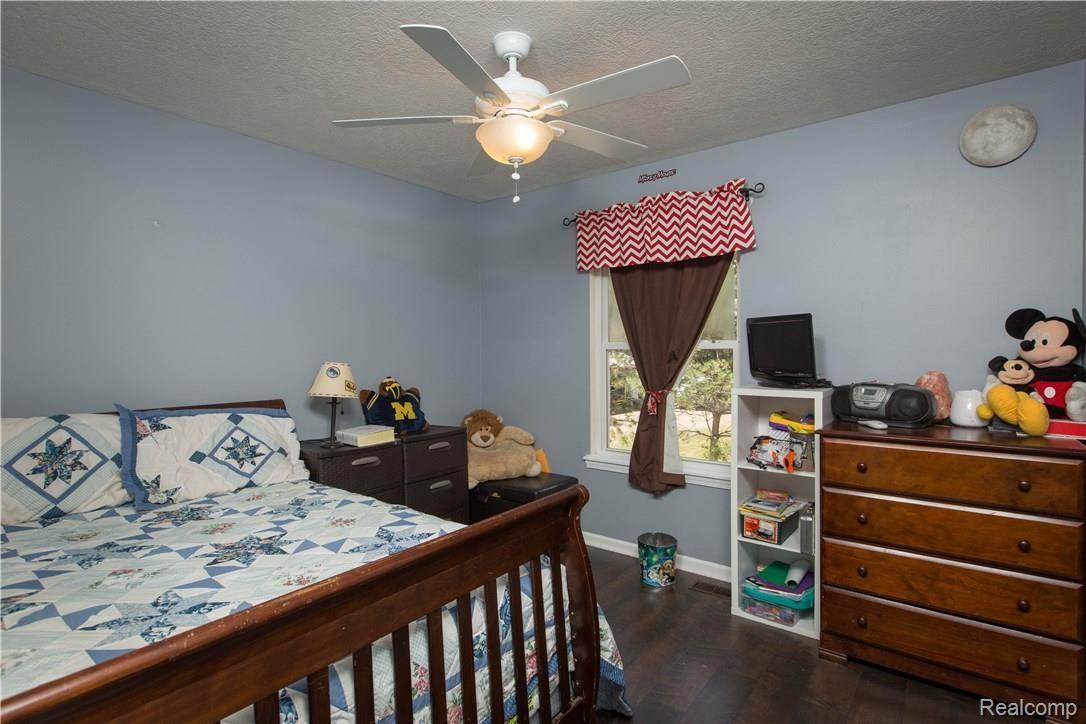 14928 South Fowlerville Road Perry, MI 48872 - Photo 7 of 27 14928 S Fowlerville Rd-Perry-bedroom2.jpg