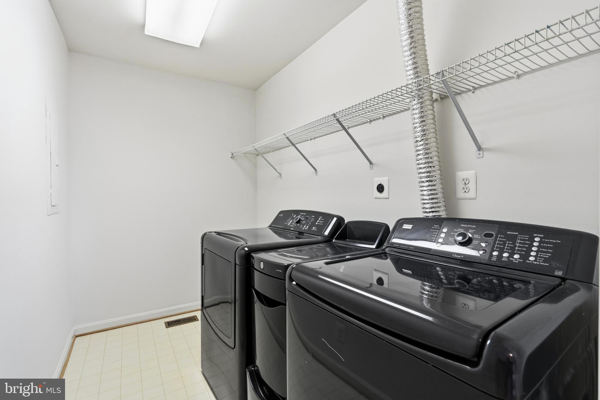 9227 Ribbon Falls Loop Bristow, VA 20136 - Photo 35 of 53 a utility room with dryer and washer