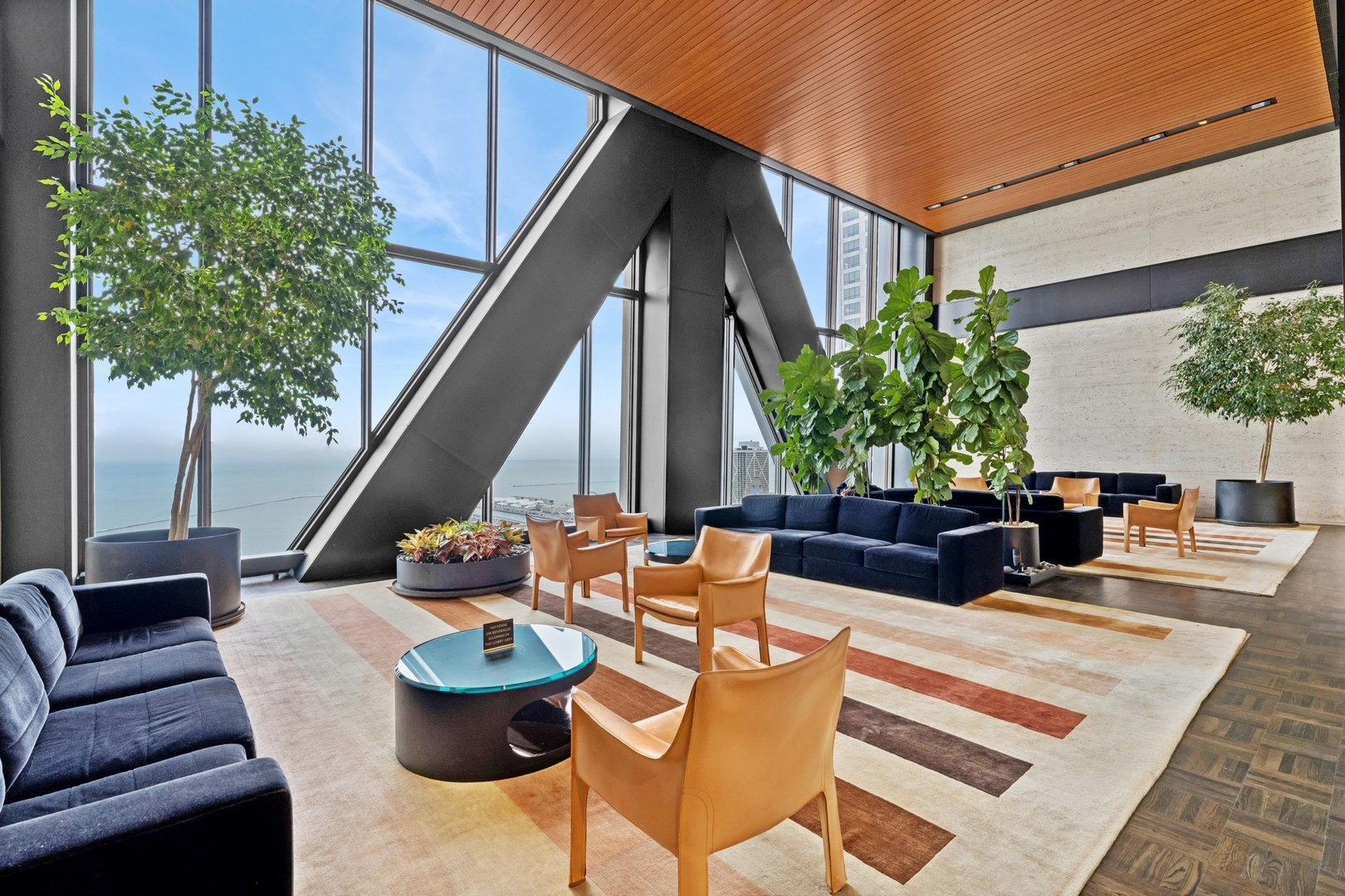 175 East Delaware Place, Unit 8504 Chicago, IL 60611 - Photo 23 of 23 a view of a patio with couches table and chairs and potted plants