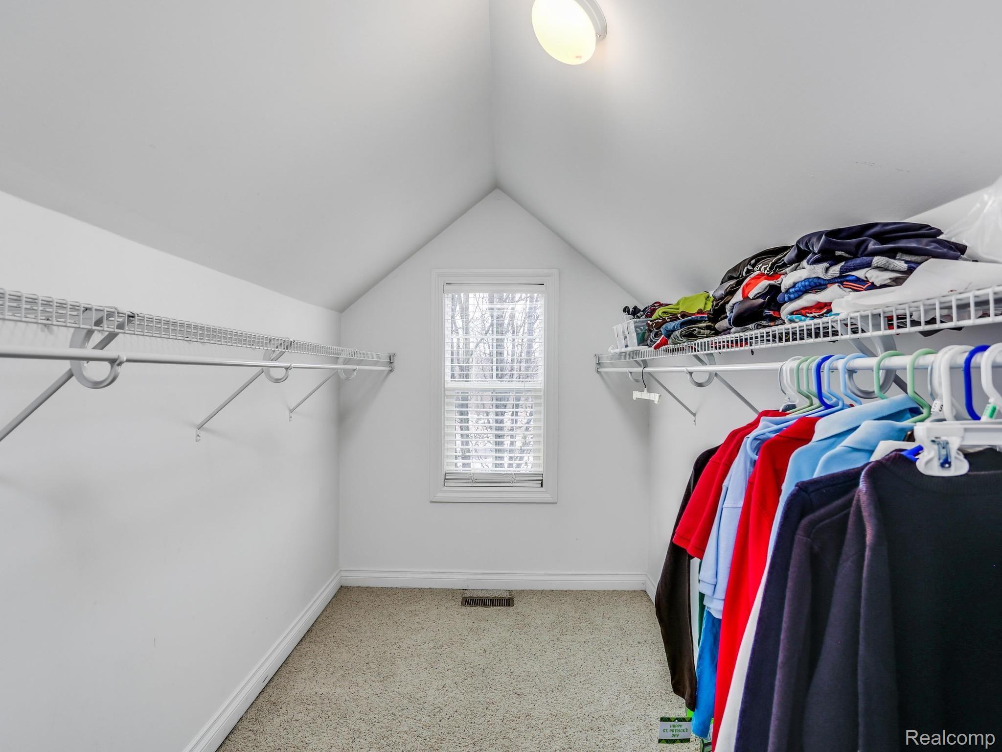 1067 Marsh Ridge Brighton, MI 48114 - Photo 26 of 39 This very large walk-in closet, big enough for a crafting desk and chair or a massive fort for story time, accompanies one of the upstairs bedrooms.