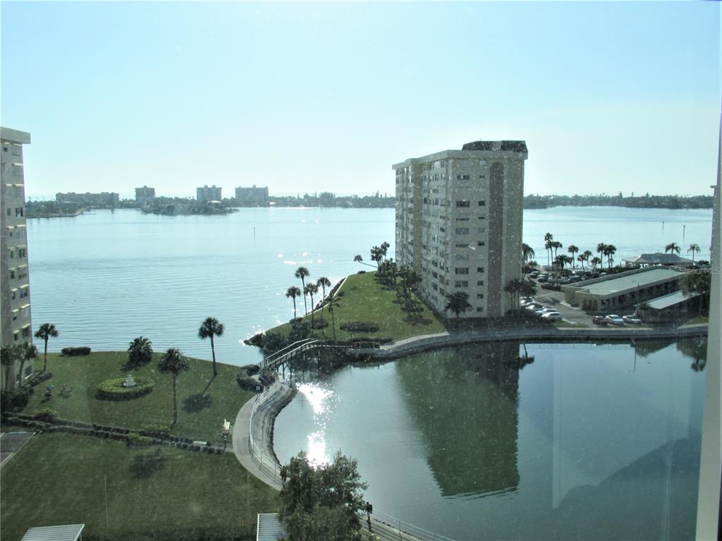 4575 Cove Circle, Unit 1004 St. Petersburg, FL 33708 - Photo 1 of 1 a view of a lake