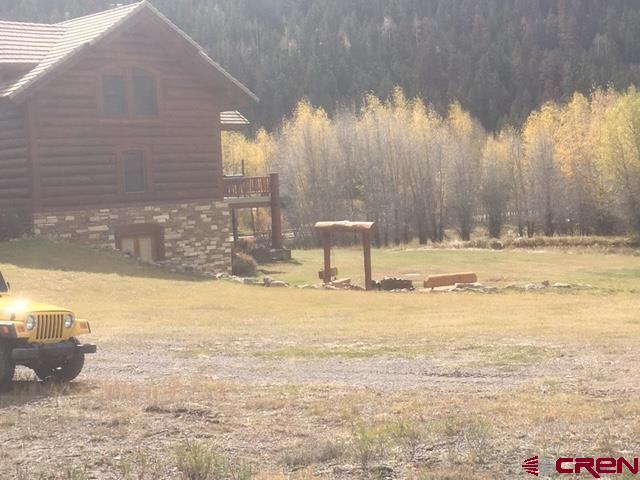 Tbd County Road 30 Road Lake City, CO 81235 - Photo 5 of 8 a view of a swimming pool with an outdoor space and seating area