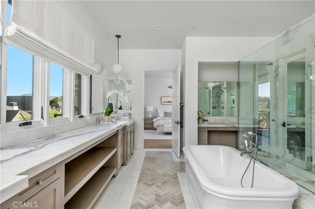 28750 Martingale Drive San Juan Capistrano, CA 92675 - Photo 21 of 45 a large white kitchen with a large tub and sink
