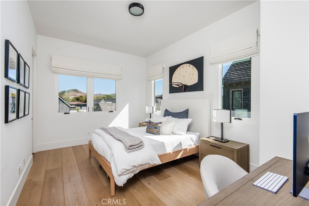 28750 Martingale Drive San Juan Capistrano, CA 92675 - Photo 24 of 45 a bedroom with a bed and a window