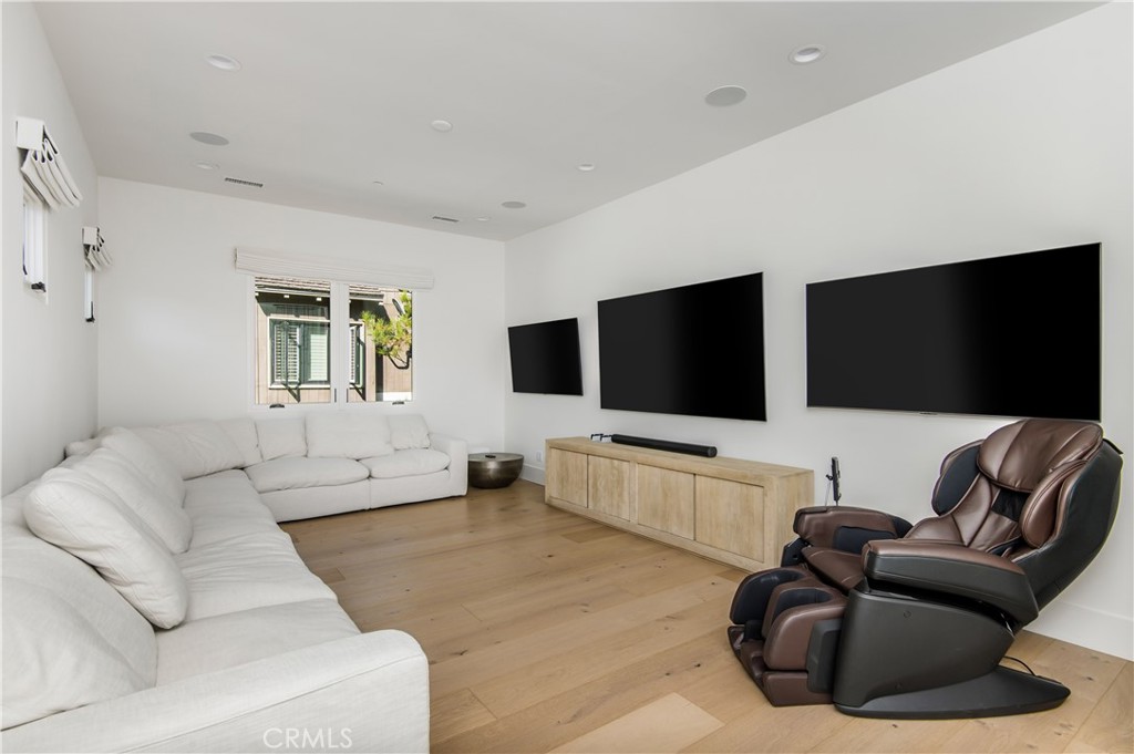 28750 Martingale Drive San Juan Capistrano, CA 92675 - Photo 29 of 45 a living room with furniture and a flat screen tv
