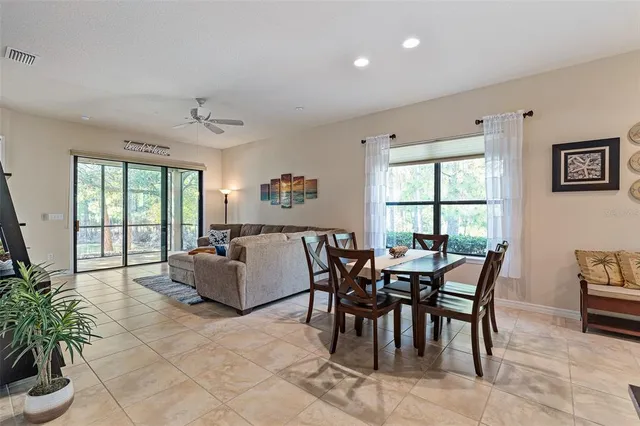 a kitchen with stainless steel appliances granite countertop a stove refrigerator sink and cabinets
