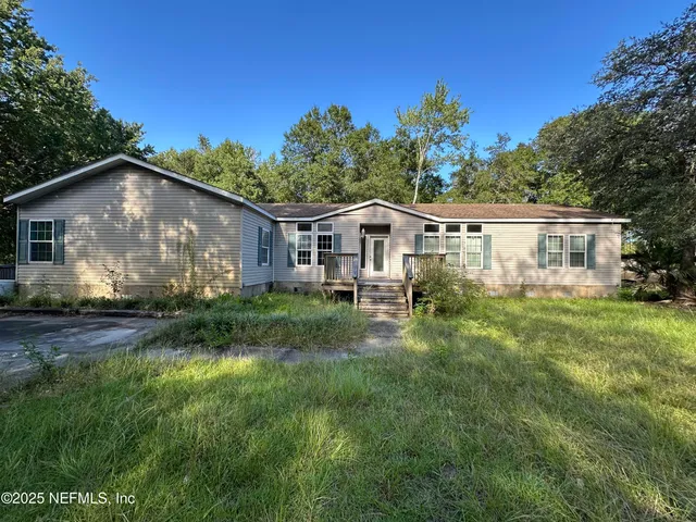a house view with a garden space