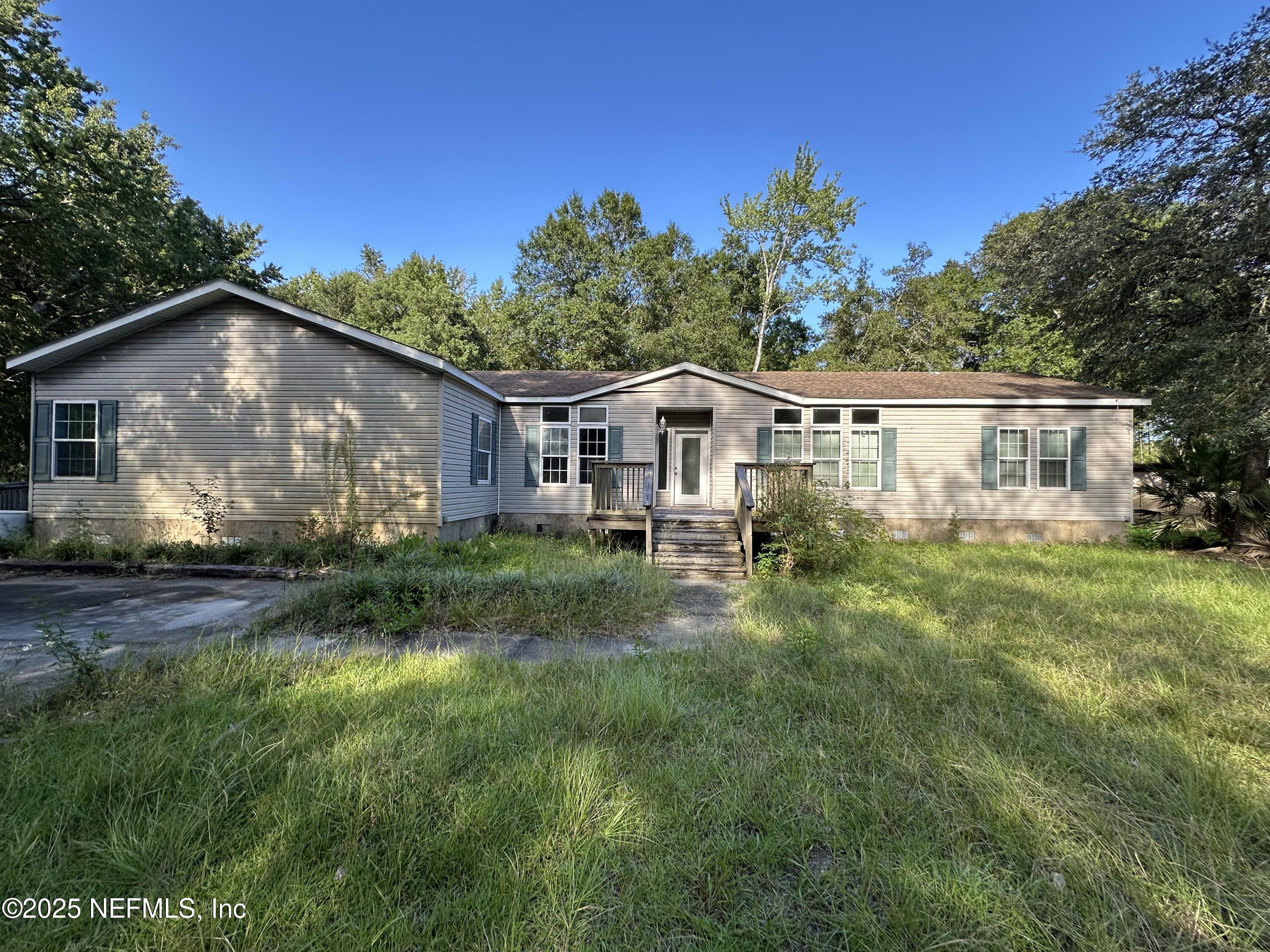 a house view with a garden space