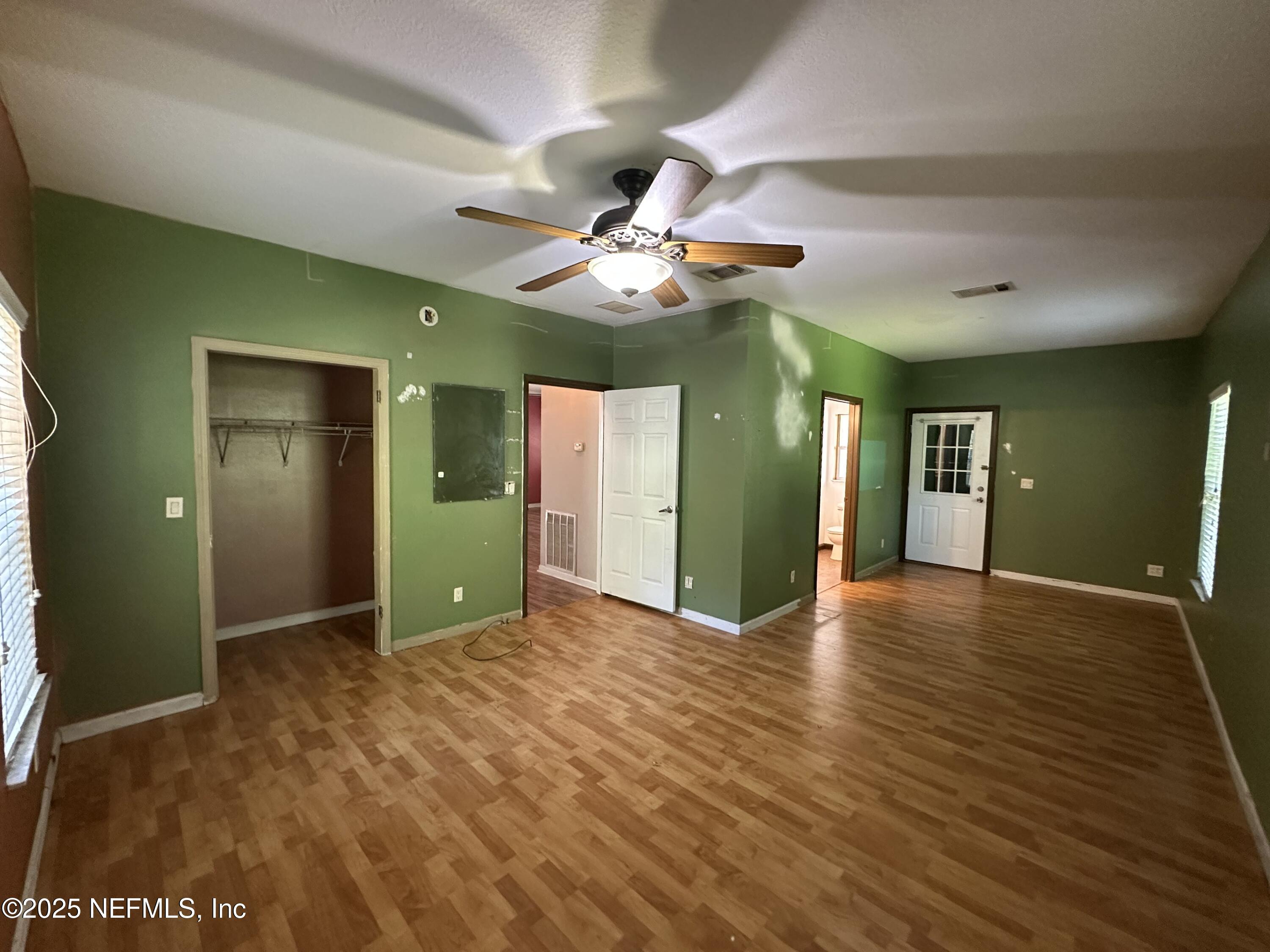 852030 Highway 17 Yulee, FL 32097 - Photo 15 of 21 a view of an empty room with kitchen and a window
