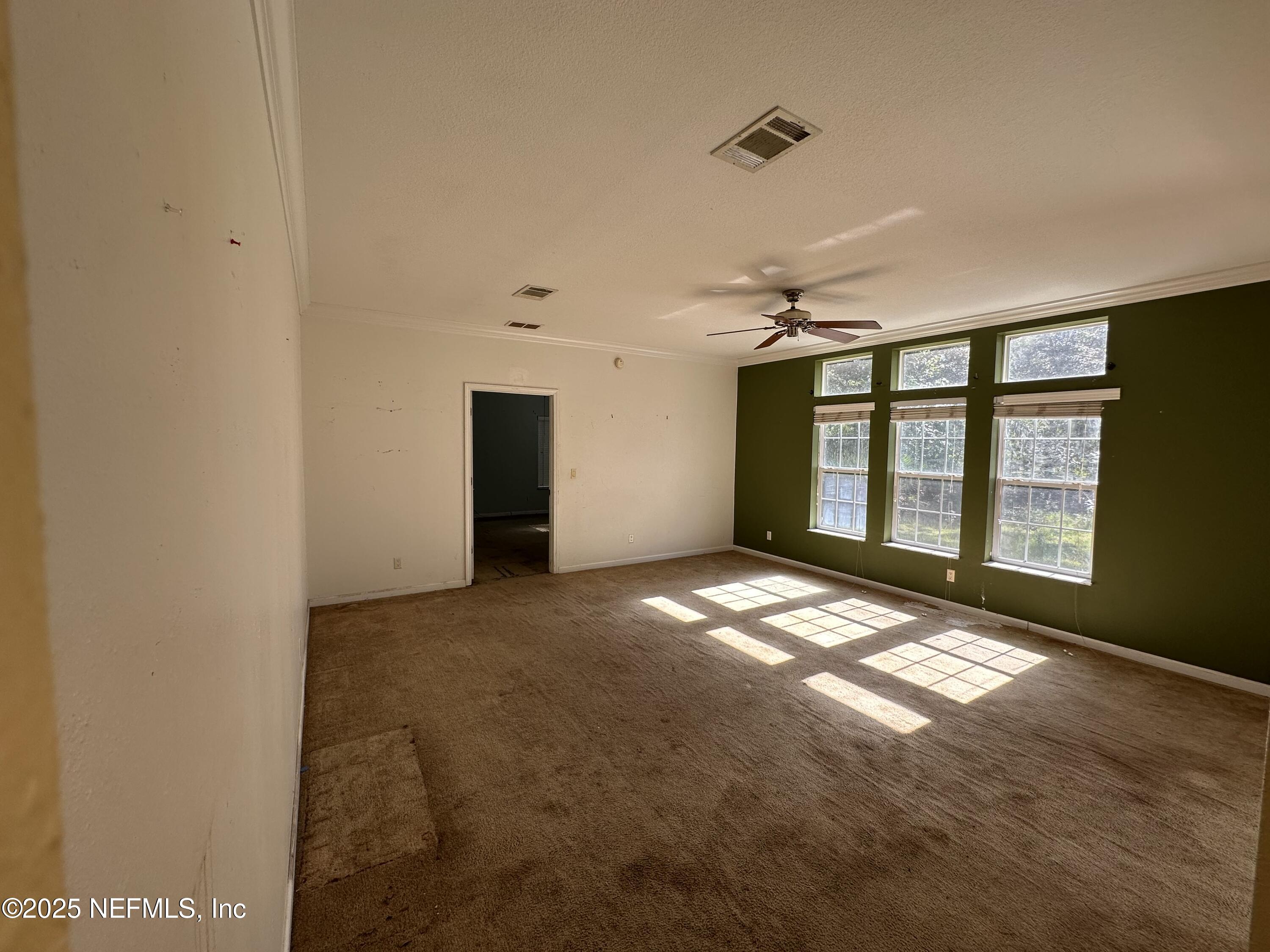 852030 Highway 17 Yulee, FL 32097 - Photo 8 of 21 a view of an empty room with a window