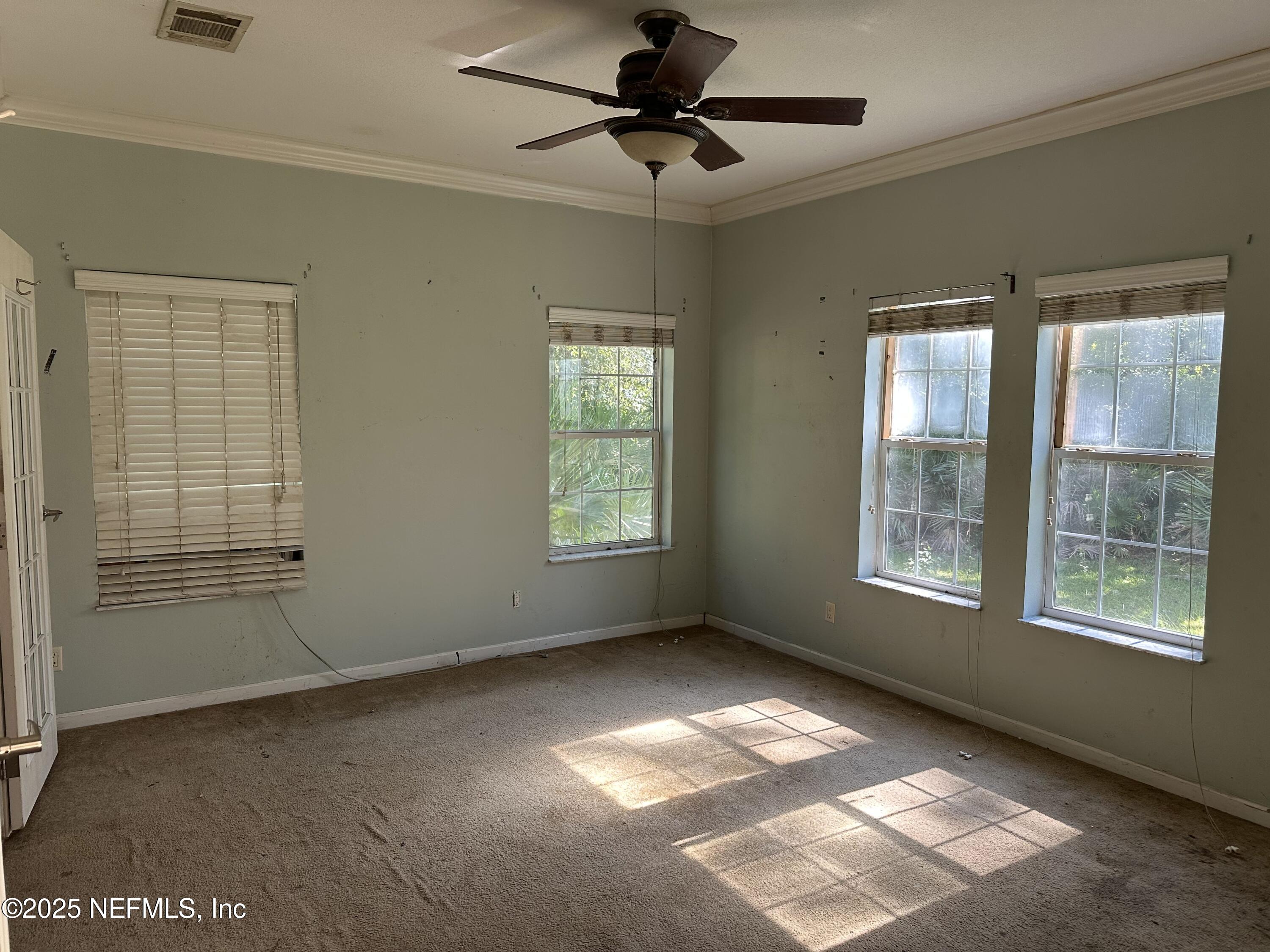 852030 Highway 17 Yulee, FL 32097 - Photo 9 of 21 a view of an empty room with a window