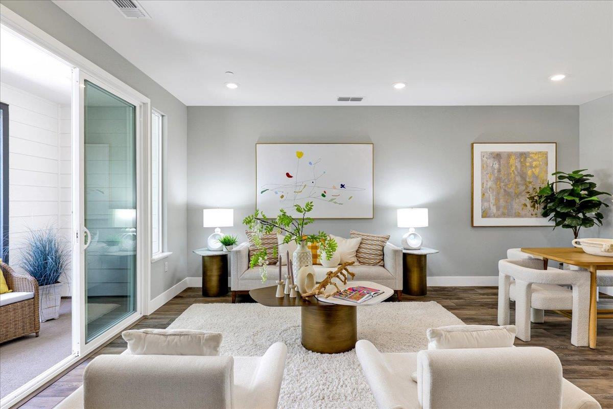 122 Ranch Lane Mountain View, CA 94040 - Photo 11 of 69 a living room with furniture a fireplace and a potted plant