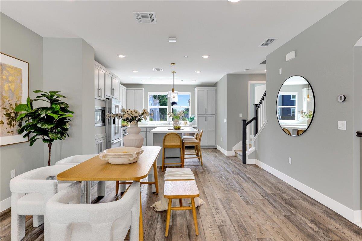 122 Ranch Lane Mountain View, CA 94040 - Photo 16 of 69 a living room with furniture a potted plant and a table