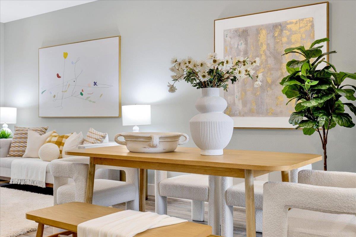 122 Ranch Lane Mountain View, CA 94040 - Photo 19 of 69 a living room with furniture flowerpot and a potted plant