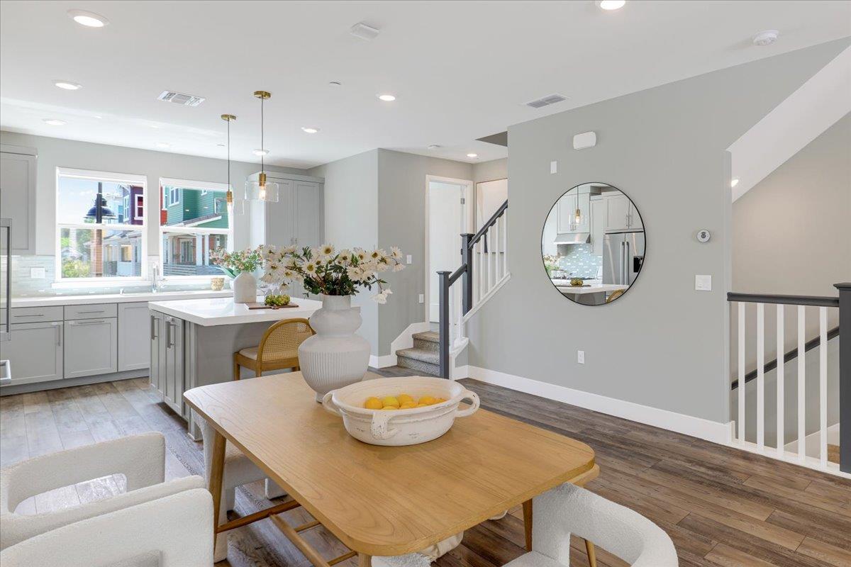 122 Ranch Lane Mountain View, CA 94040 - Photo 20 of 69 a view of a dining room with furniture and a chandelier