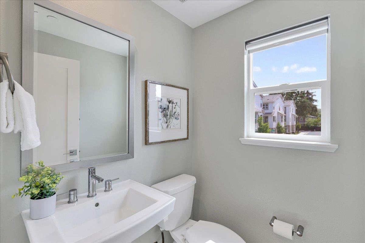 122 Ranch Lane Mountain View, CA 94040 - Photo 31 of 69 a bathroom with a toilet a sink and mirror