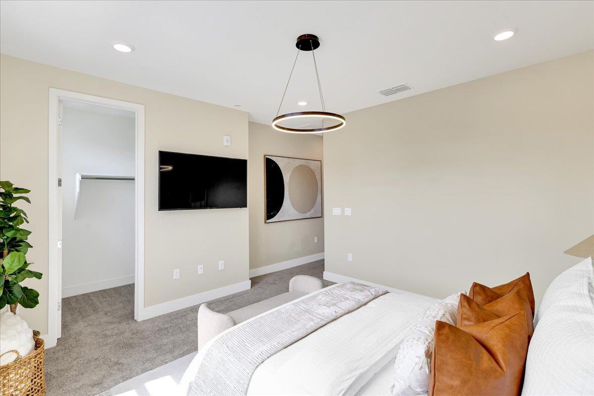 122 Ranch Lane Mountain View, CA 94040 - Photo 34 of 69 a bedroom with a bed and a television