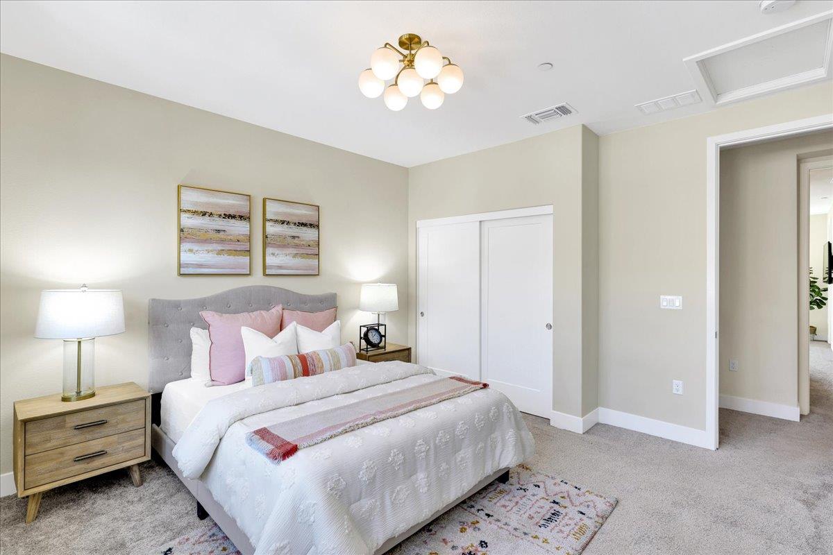 122 Ranch Lane Mountain View, CA 94040 - Photo 46 of 69 a bedroom with a bed and a lamp