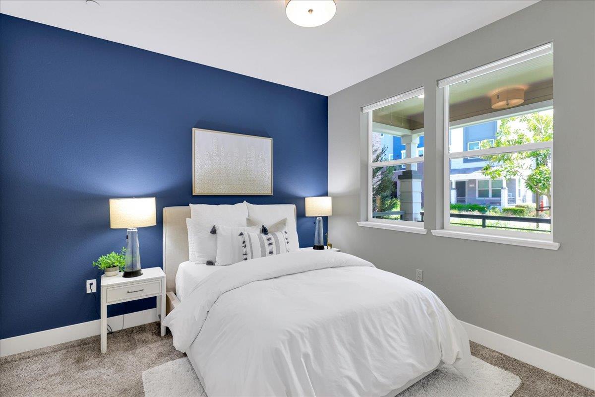 122 Ranch Lane Mountain View, CA 94040 - Photo 49 of 69 a bedroom with a bed and a window