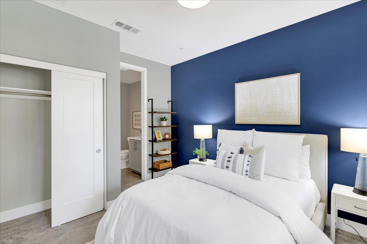 122 Ranch Lane Mountain View, CA 94040 - Photo 50 of 69 a bedroom with a bed and a lamp