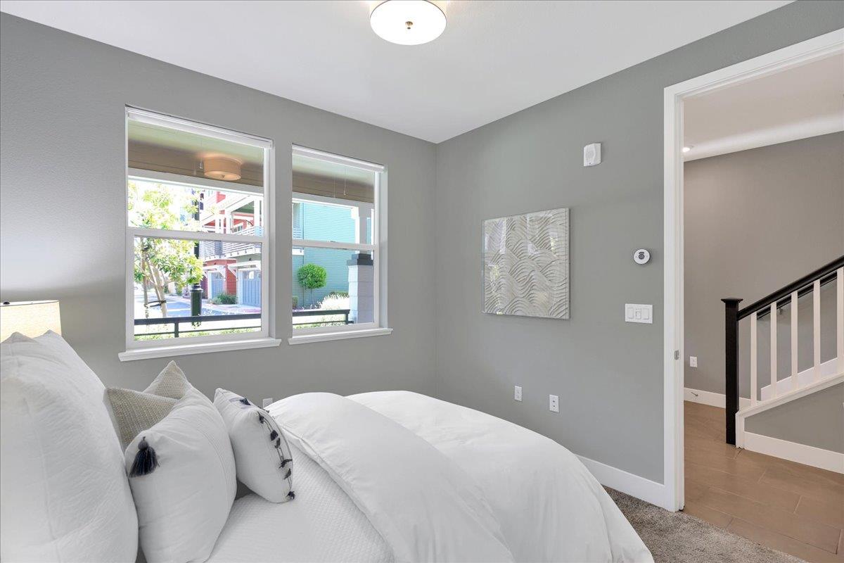 122 Ranch Lane Mountain View, CA 94040 - Photo 51 of 69 a bedroom with a bed and a window