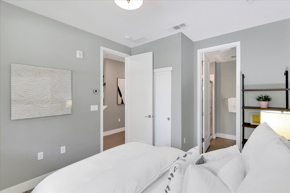 122 Ranch Lane Mountain View, CA 94040 - Photo 52 of 69 a bedroom with a bed and a view of bathroom