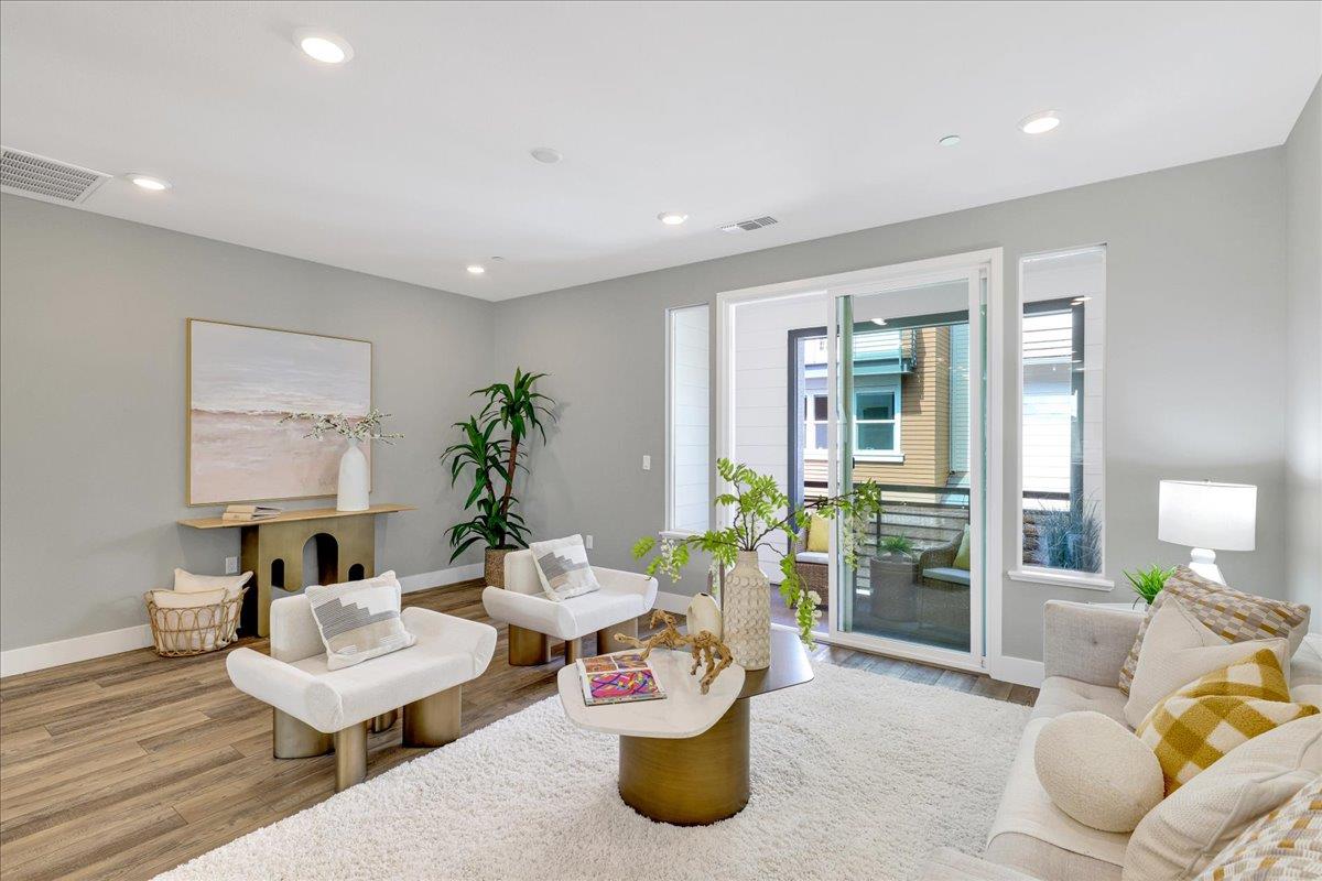 122 Ranch Lane Mountain View, CA 94040 - Photo 9 of 69 a living room with furniture and a potted plant