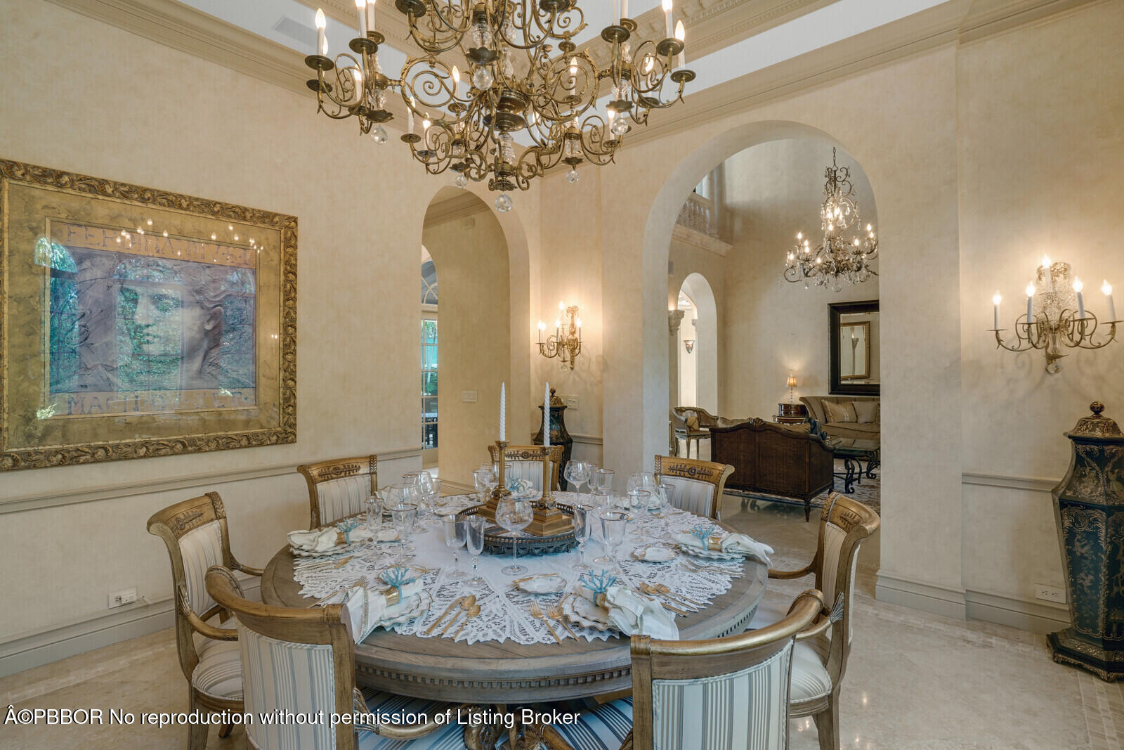 231 Wells Road Palm Beach, FL 33480 - Photo 13 of 39 a view of a dining room with furniture and chandelier