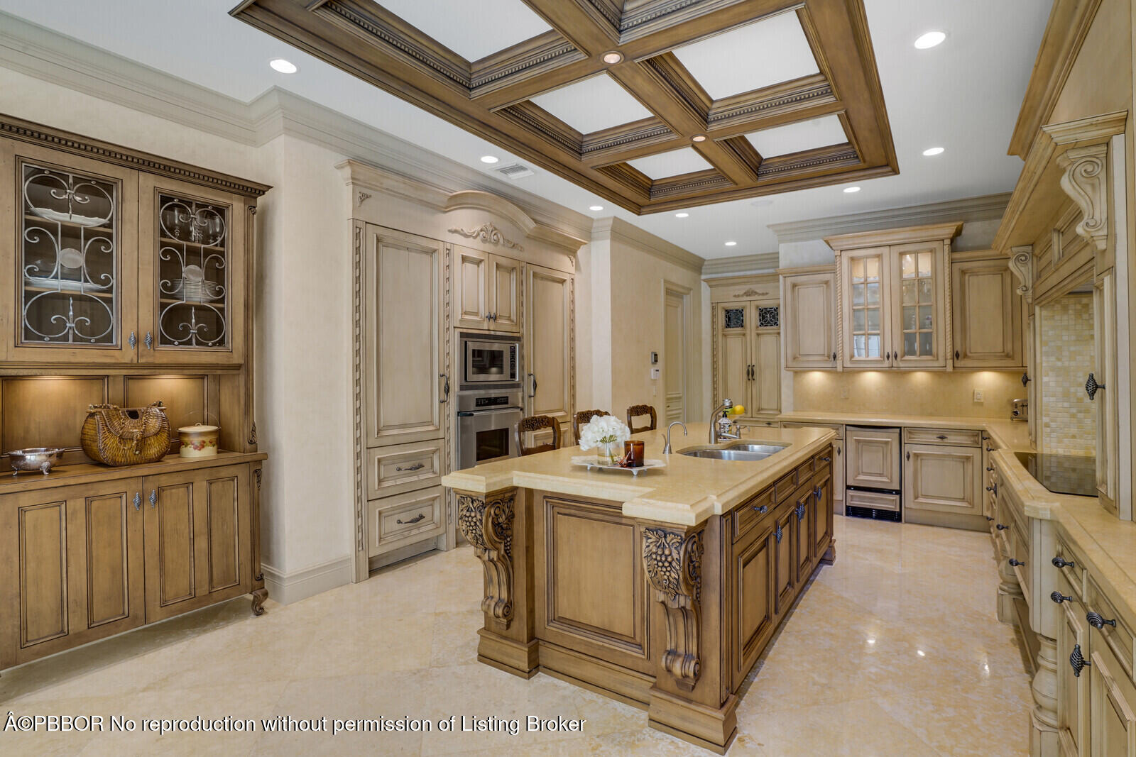 231 Wells Road Palm Beach, FL 33480 - Photo 18 of 39 a kitchen that has a lot of cabinets in it