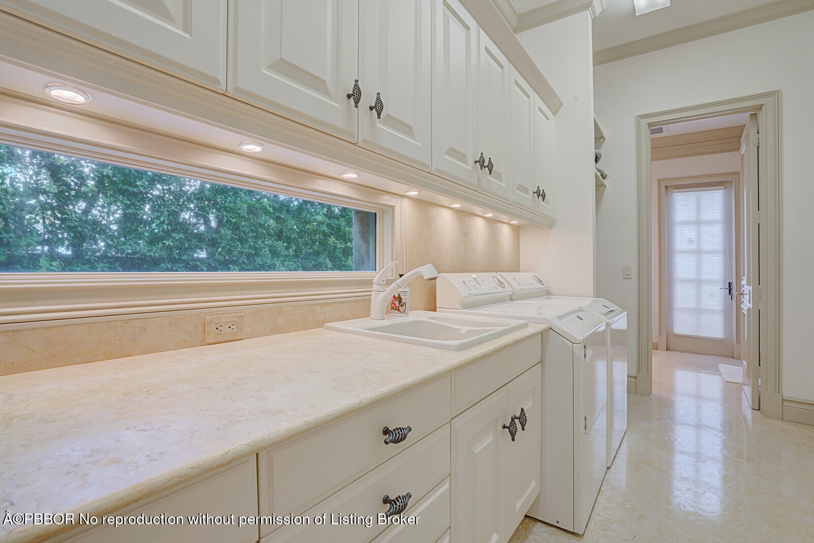 231 Wells Road Palm Beach, FL 33480 - Photo 23 of 39 a bathroom with a sink and a mirror